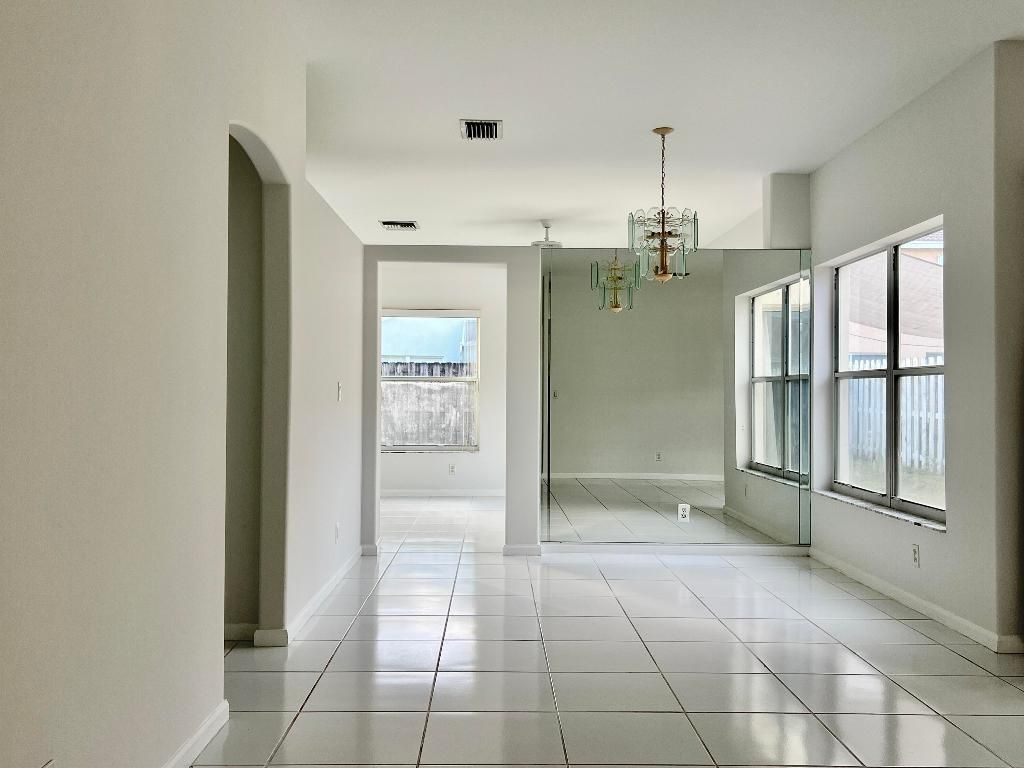 Photo of 6909 Desert Inn Terrace, Lake Worth, FL 33463 (MLS # R11156689)