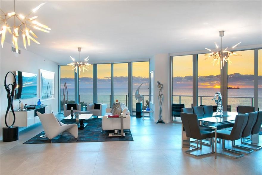 BACK ON MARKET.  Luxury at It's Best. SE Direct Oceanfront Residence that shows like a model.  This designer smart home has the most amazing ocean & city views. Open floorplan with 10' impact glass windows & doors.  Wrap around balconies that allow you to see both astonishing sunrises & sunsets.  4 bedroom, 4.5 bathroom with private elevator that opens to your foyer.  2 parking spaces with a 3rd for a golf cart.  Italian 30x60 tile flooring throughout, extra storage, electric shades, custom closets & doors, Italkraft designer kitchen & more.  World class amenities in a premier building. Full beachside/pool service, poolside bar, concierge, valet, state of the art Fitness center, pet friendly, & Oceanfront restaurant coming soon.  Walk to shops, dining, & Las Olas. Luxury at It's Best. SE Direct Oceanfront Residence that shows like a model.  This designer smart home condo has the most amazing ocean & city views. Open floorplan with 10' impact glass windows & doors. Wrap around balconies that allow you to see both astonishing sunrises & sunsets.  4 bedroom, 4.5 bathroom with private elevator that opens to your foyer.  2 parking spaces with a 3rd for a golf cart.  Italian 30x60 tile flooring throughout, extra storage, electric shades, custom closets & doors, Italkraft designer kitchen & more.  World class amenities in a premier building. Full beachside/pool service, poolside bar, concierge, valet, state of the art Fitness center, pet friendly, & Oceanfront restaurant coming soon. Only 95 luxury condos. Walk to shops, dining, & Las Olas. A must see