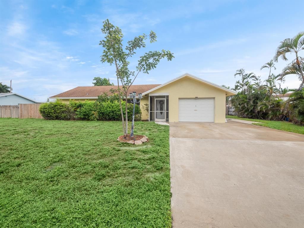 Photo of 3059 Tropical Trail, Lake Worth, FL 33462 (MLS # R10846364)