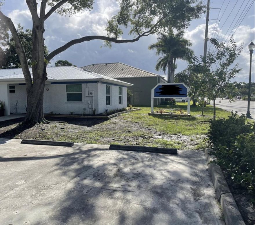 Free standing office building with plenty of parking.  6 private offices and large conference room.  2 bathrooms.  Brick building with Newer metal roof, Impact windows and doors, New AC and tankless HW.  Ready to go office with direct access to Port St Lucie Blvd.  More than 38,000 cars per day.  Direct signage.