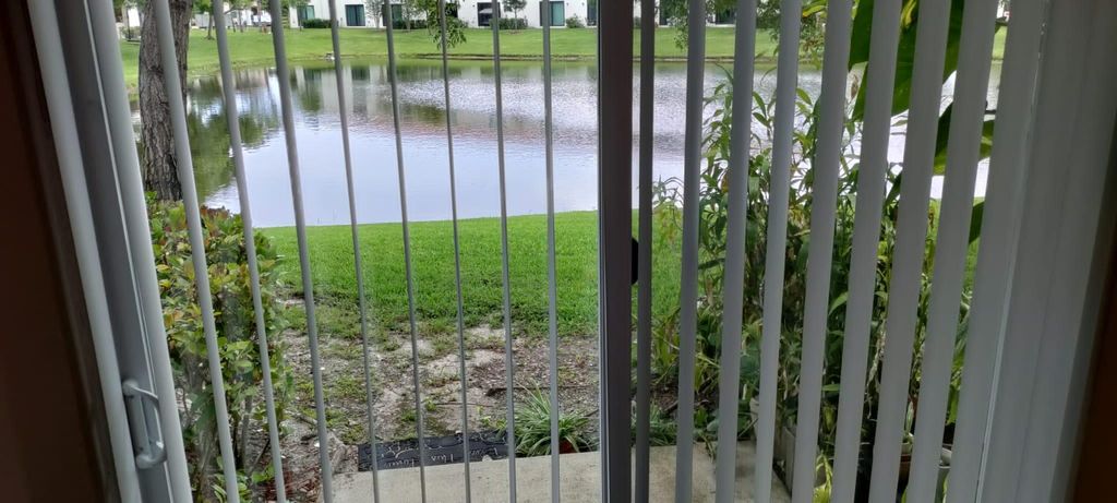 Photo of 4159 Napoli Lake Drive, Riviera Beach, FL 33410 (MLS # R10896395)