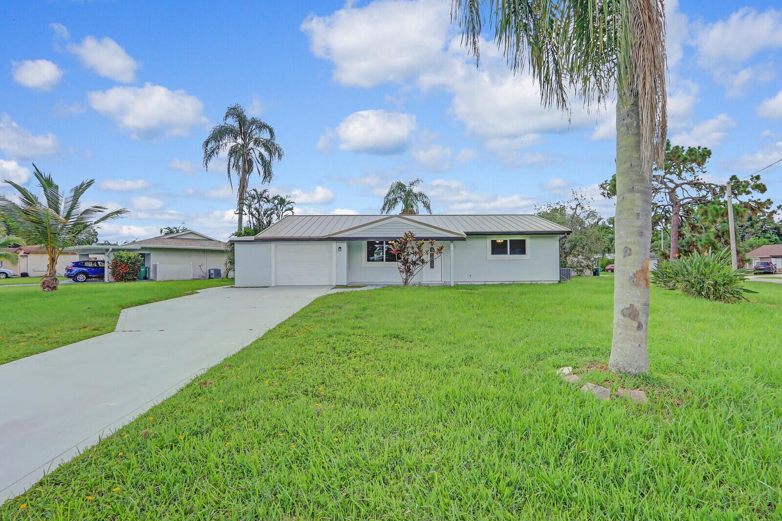 NEW METAL ROOF & IMPACT WINDOWS! COUNTY ONLY TAXES. THIS CHARMING 2 BEDROOM 2 BATH HOME HAS BEEN COMPLETELY REMODELED AND IS READY FOR YOU TO MOVE RIGHT IN. KITCHEN FULLY EQUIPTED WITH QUARTZ COUNTER TOPS WHITE SHAKER CABINETS & SS APPLIANCES. EASY FLOWS TO OUTDOOR COVERED SCREENED LANAI PERFECT FOR ENTERTAINING, BBQ & EVEN YOUR FUR BABIES. LVP FLOORS THROUGHOUT. NEW AC & WH 2024. LARGE CORNER LOT. CENTRALLY LOCATED WITH EASY ACCESS TO 95, TURNPIKE & US 1, CLOSE TO SHOPPING & RESTAURANTS.