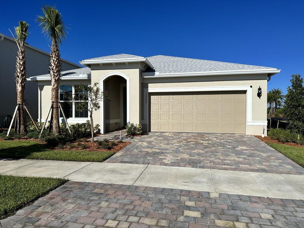 Photo of 12282 SW Myrtle Oak Dr, Port St Lucie, FL 34987 (MLS # R10921627)