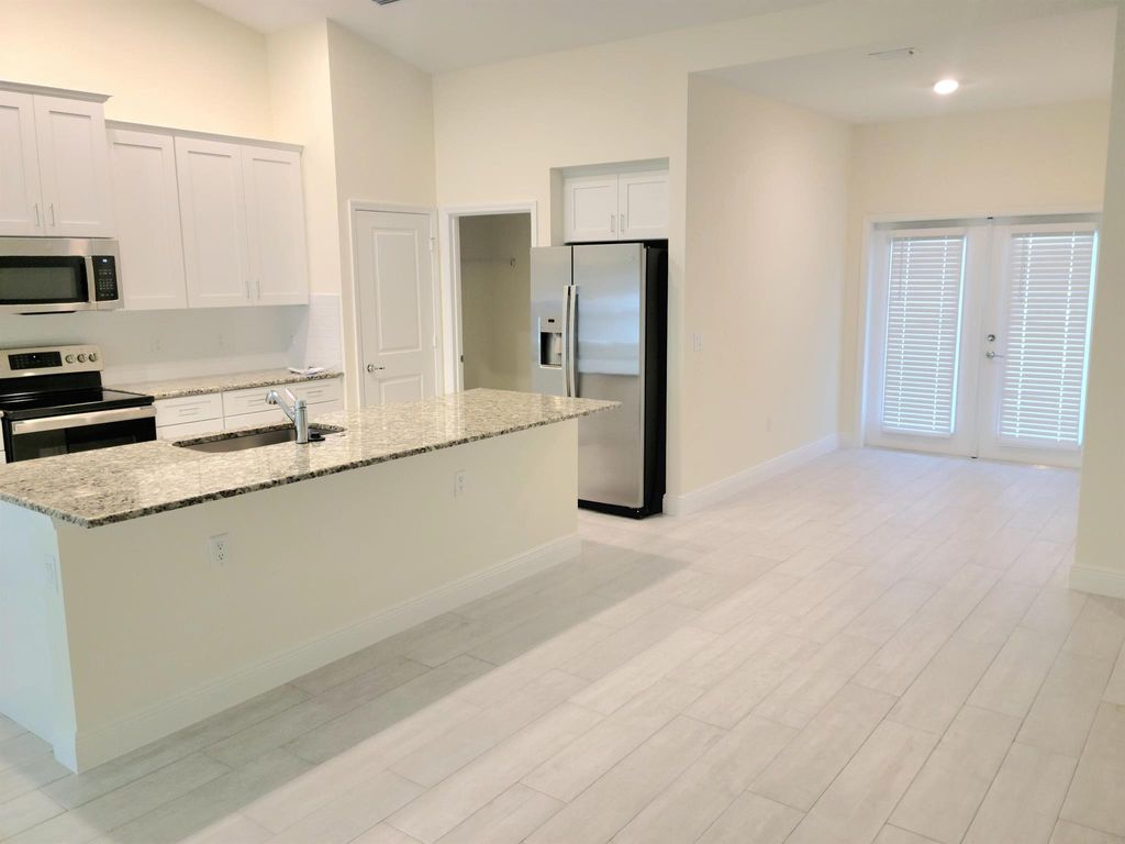 Photo of 941 SW California Boulevard, Port St Lucie, FL 34953 (MLS # R11109059)