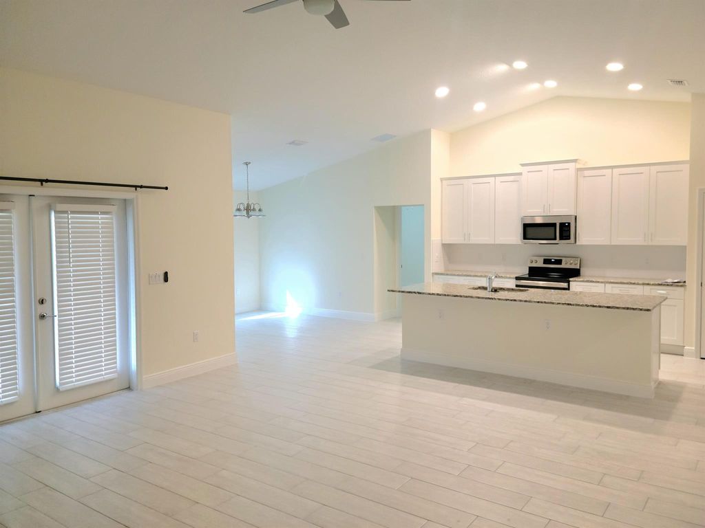 Photo of 941 SW California Boulevard, Port St Lucie, FL 34953 (MLS # R11109059)