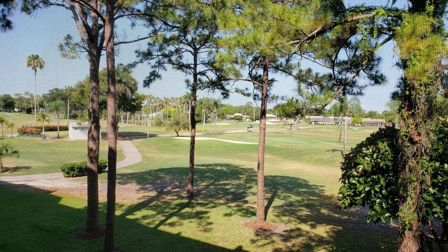 Beautiful bright condo with fantastic views of the golf course. Updated kitchen and baths. Tastefully furnished just bring your personal items. Large screened balcony. There are newly installed hurricane windows for your protection. Washer & Dryer in unit. Clubhouse has many activities, cafe' and much more. You are close to the clubhouse, pools, golf, entertainment , shopping and more. See it today. Enjoy the Florida lifestyle at it's best!