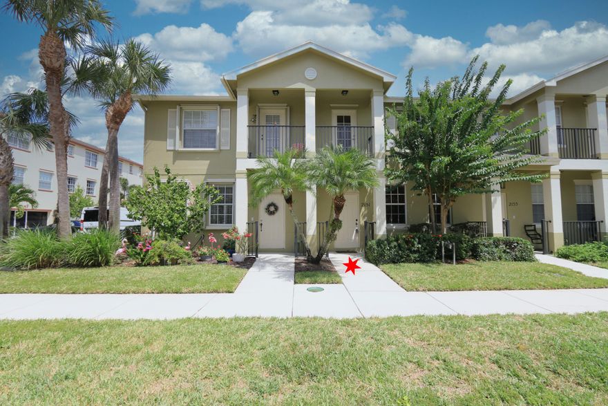 This stunning townhome is located east of US 1 family and pet friendly community!  This 2 Bedroom 2.5 baths one car garage and open balcony.  Eastlake Village Community is close to shopping, beaches and restaurants. Two main suites with their own ensuite bathroom and a powder room down stairs. Kitchen w/tall 46''cabinets, crown molding, breakfast area and new stove. Newer wood look tile floors in living room. 9'' ceilings and half bath downstairs. Inside laundry room includes washer and dyer. Community features heated pool, bike/jogging path, lake, playground and so much more! A must see.  Newer Water Heater (2025) New roof installed (2025), Ring Camera, New floors (2025).