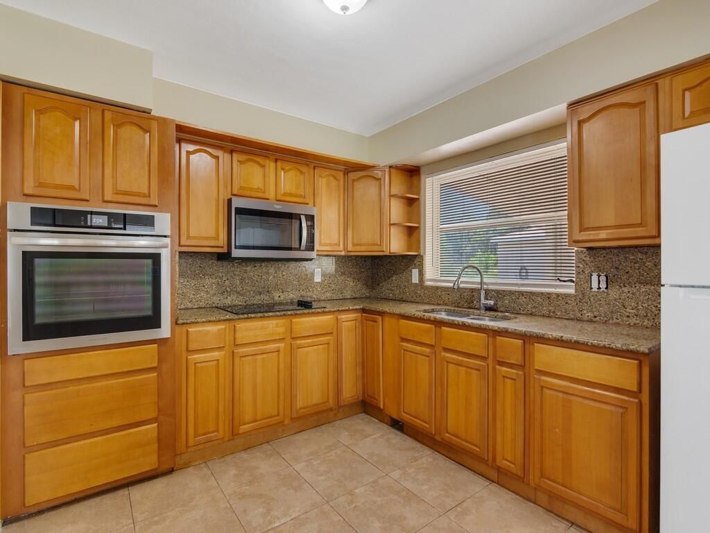 Photo of 7707 James Road, Fort Pierce, FL 34951 (MLS # R11153119)