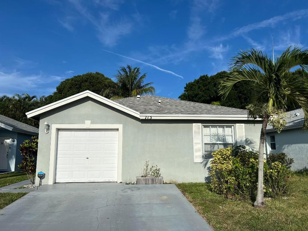Photo of 713 W Key Street W, Boynton Beach, FL 33426 (MLS # R11113112)