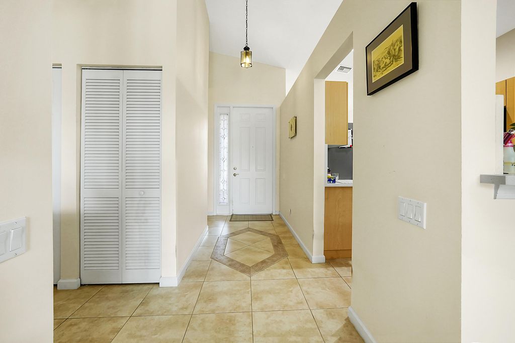 Photo of 390 NW Breezy Point Loop, Port Saint Lucie, FL 34986 (MLS # B26056324)