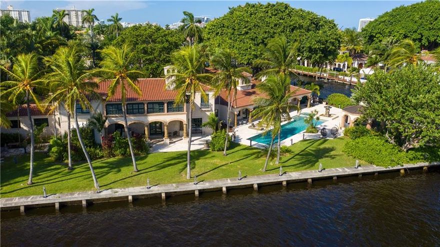 With over 520ft of deep water front and 52,895sf of breathtaking land, this iconic architectural gem offers unrelenting intracoastal views. Famously known as the Anheuser Busch estate, this home has a history and sculptural Banyon tree that will draw you into that gracious world of extravagant soirees and elegant high teas. With 8 beautifully appointed en-suite bedrooms, expansive family rooms, eclectic billiard room and an amphitheater stage overlooking a decorative piazza, this is refined island living at its best. Add to that the distinctive gazebo for outdoor dining, an oversized lap pool and jacuzzi with sculptured fountain, double glazed hurricane impact windows, 30ft long chef's kitchen, city gas generator and lush landscaping and you have an exceptional place to call home.