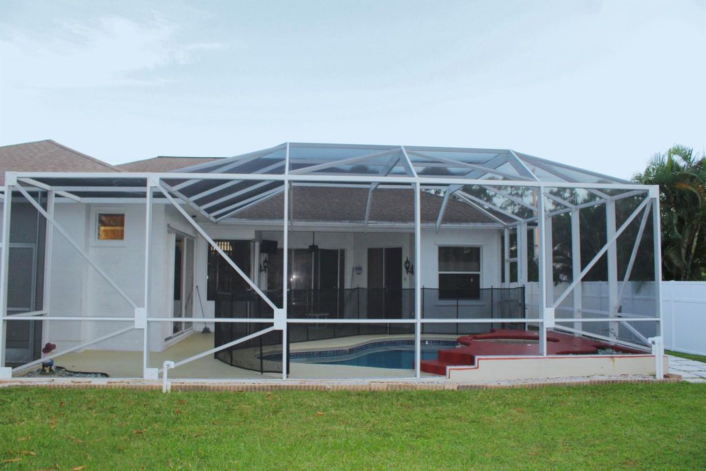 Photo of 425 SE Evergreen Terrace, Port Saint Lucie, FL 34983 (MLS # R11030991)