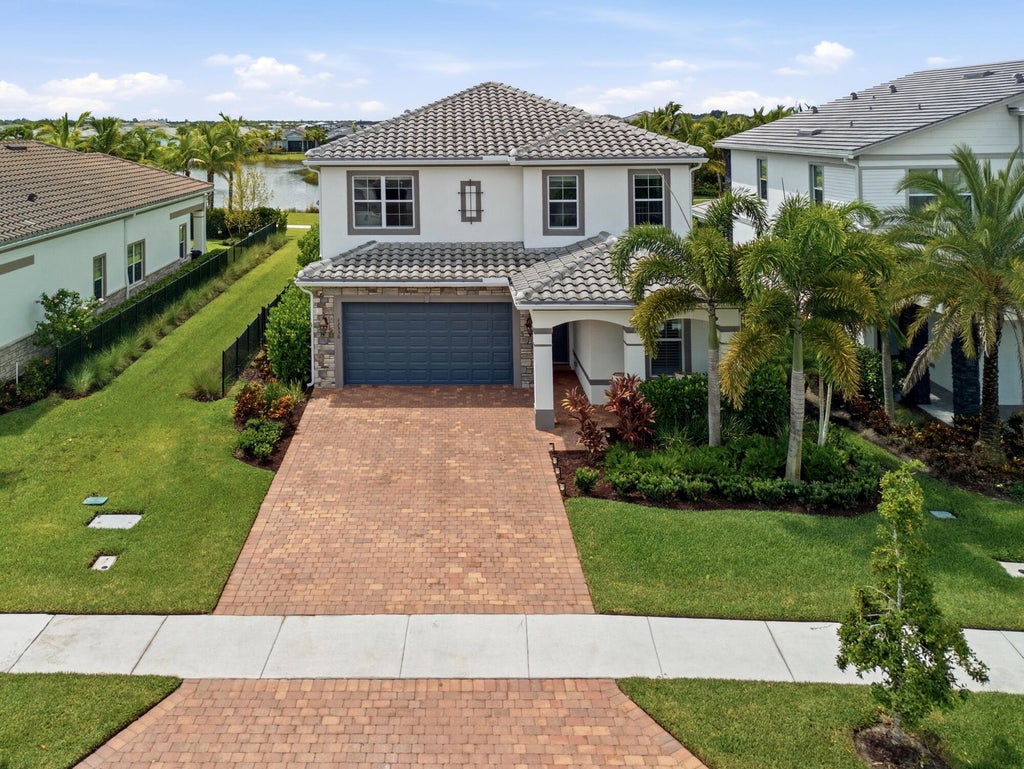 Photo of 12530 Triumph Lane, Palm Beach Gardens, FL 33412 (MLS # B26074500)