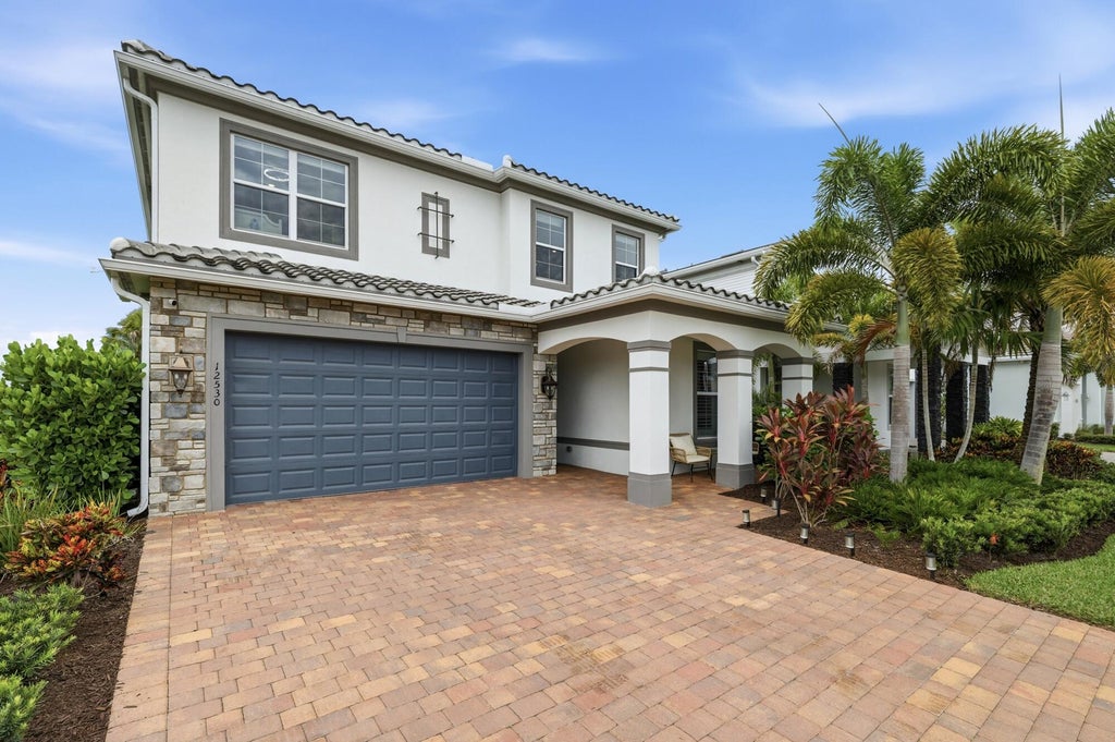 Photo of 12530 Triumph Lane, Palm Beach Gardens, FL 33412 (MLS # B26074500)