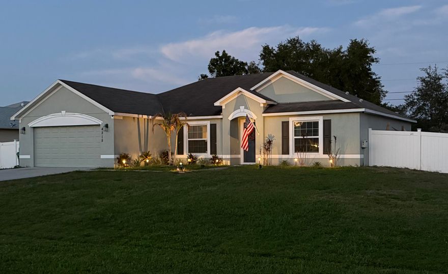 Welcome to 4215 SW Elba Street in Port St. Lucie's highly desirable Becker area, a beautifully maintained 4-bedroom, 2-bath CBS home offering the perfect blend of newer construction, modern upgrades, and an unbeatable location. Built in 2019 and situated on an oversized 0.24-acre lot, this move-in-ready home offers all the benefits of newer construction without the wait. Featuring full hurricane protection, and solid CBS construction, this home delivers peace of mind for years to come. Inside, you'll find a bright and functional split floor plan designed for comfortable everyday living. Stylish custom touches include gorgeous board and batten accent walls in the spacious primary suite and guest bathroom, adding warmth and character  throughout. The oversized backyard offers plenty of room for a custom pool, outdoor kitchen, firepit, or backyard oasis, making it ideal for entertaining and enjoying the Florida lifestyle. Perfectly located just minutes from Becker Road, I-95, Florida's Turnpike, Tradition, shopping, dining, top-rated schools, and commuter routes, this home provides quick access to everything Port St. Lucie has to offer while tucked away in a quiet residential neighborhood. Why wait to build? This newer Port St. Lucie home is move-in ready and waiting for its next owners.