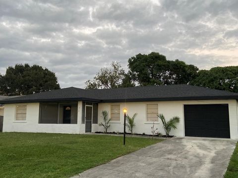 Photo of 313 NW Dorchester Street, Port St Lucie, FL 34983 (MLS # R11136649) Photo of 313 NW Dorchester Street, Port St Lucie, FL 34983 (MLS # R11136649)