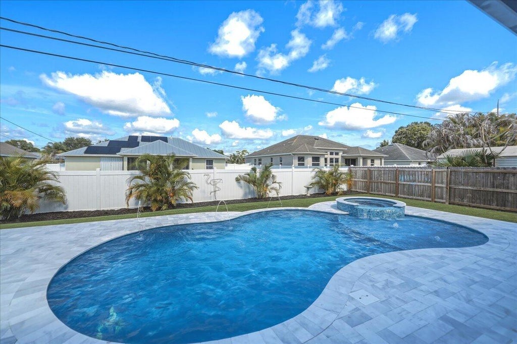 Photo of 2142 SW Pruitt Street, Port Saint Lucie, FL 34953 (MLS # B26041381)