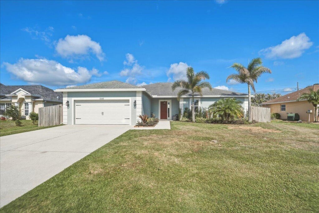 Photo of 2142 SW Pruitt Street, Port Saint Lucie, FL 34953 (MLS # B26041381)