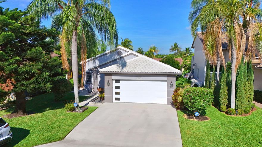 Beautifully renovated lakefront residence in the exclusive Harbors at Riverglen. This 3BR/2BA home offers 1,780 sq ft of thoughtfully upgraded living space, featuring a designer kitchen with white shaker cabinetry, quartz countertops, and black stainless steel appliances. Enjoy tranquil water views from the covered, screened lanai. Additional highlights include full hurricane protection and a fully remodeled, air-conditioned 2-car garage. Located in a private, park-like community with clubhouse, fitness center, pool, and tennis. Easy access to I-95, Turnpike, and Tri-Rail.