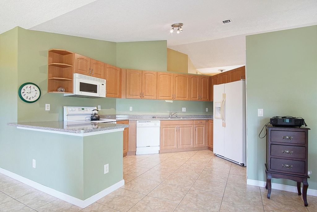 Photo of 5864 NW Favian Avenue, Port Saint Lucie, FL 34986 (MLS # R11133401)