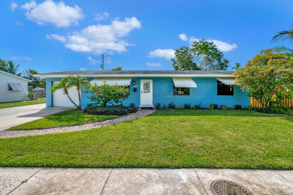 Photo of 709 Gumtree Road, North Palm Beach, FL 33408 (MLS # R11007231)