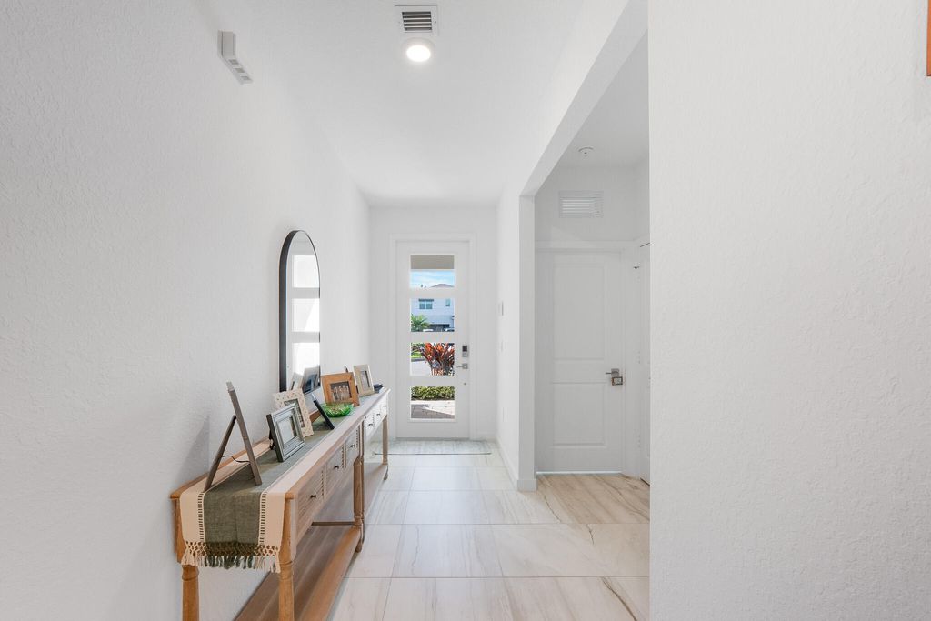 Photo of 2033 NE Ocean Dunes Drive, Jensen Beach, FL 34957 (MLS # R11159093)