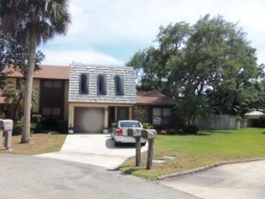 Gorgeous New Kitchen any gourmet cook would love. White cabinets with lots of granite counters, breakfast bar & open to family room & dining room.Beautiful new floors, new master bedroom vanity & flooring. Freshly painted. Oversized large fenced in backyard with plenty of room for pool overlooking canal - Great location minutesto up scale shopping,beaches,schools & so much more! 2/2 + Den/Loft can be converted to 3rd bedroom.Bring your fussiest Buyer. This is a 10++ Washer & Dryer Do Not Convey