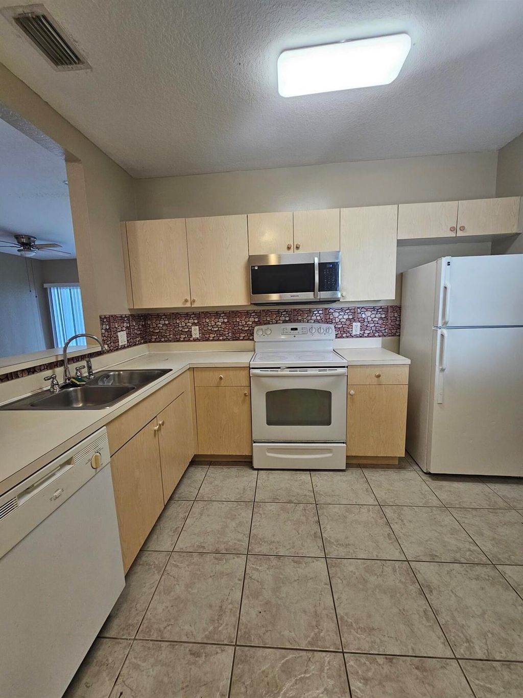 Photo of 1157 Golden Lakes Boulevard #623, West Palm Beach, FL 33411 (MLS # R11130196)