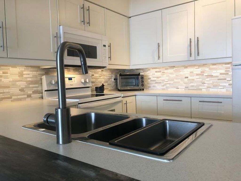 Photo of 620 Ocean Dunes Circle, Jupiter, FL 33477 (MLS # R10883070)