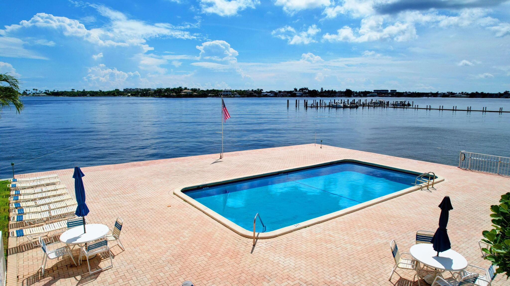 55+ ACTIVE LIFESTYLE COMMUNITY. AVAILABLE FOR 3-6 MONTHS LEASE NOT TO GO PAST 12/31/2025. THIS IMMACULATE TOP FLOOR 1/1 CONDO WITH OPEN FLOOR PLAN. LARGE GLASS DOORS FACING SOUTHERN EXPOSURE, BRING IN AN ABUNDANCE OF SUNSHINE, MAKING THE CONDO VERY BRIGHT. BEAUTIFUL VIEW OF LUSH GREENERY AND INTRACOASTAL WATERWAY, VERY PRIVATE. UPDATED KITCHEN WITH WOOD CABINETRY, COZY EATING AREA OPENS TO LARGE LIVING ROOM NEXT TO THE ENCLOSED OPEN PATIO, NEW A/C OCTOBER 2024. FANTASTIC USE OF SPACE. LARGE BEDROOM OFF LIVING ROOM. FABUOLUS COMMUNITY, POOL HAS UNBELIEVABLE PANORAMIC VIEWS OF INTRACOASTAL WATERWAY FOR RELAXING TIMES.