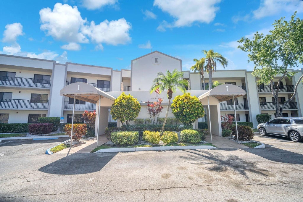 Photo of 10839 W Clairmont Circle #209, Tamarac, FL 33321 (MLS # F10492280)