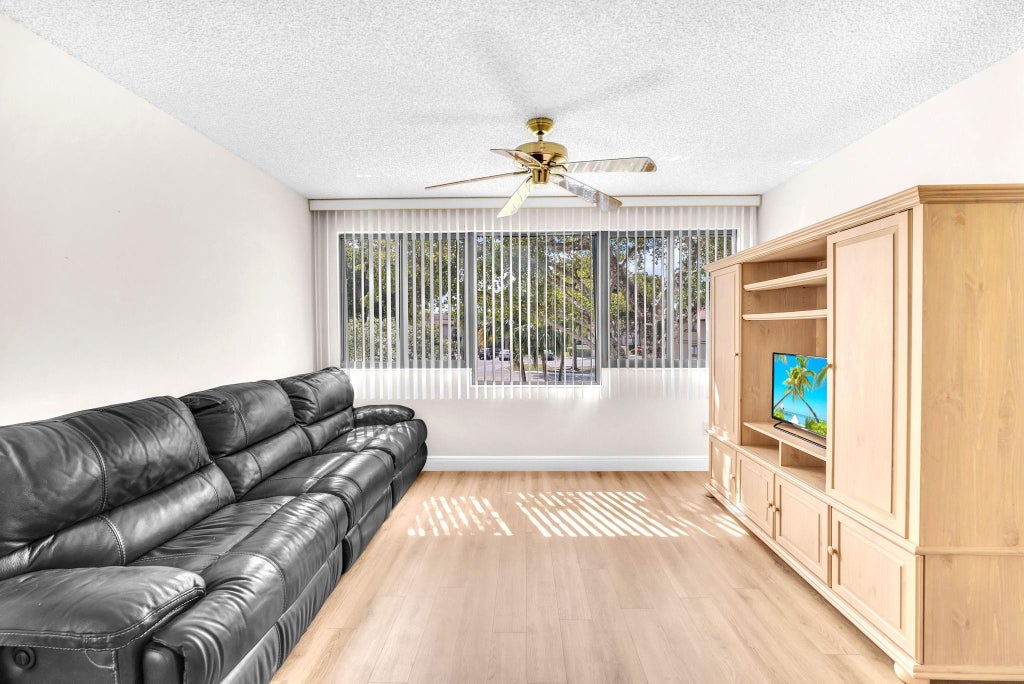 Photo of 10839 W Clairmont Circle #209, Tamarac, FL 33321 (MLS # F10492280)