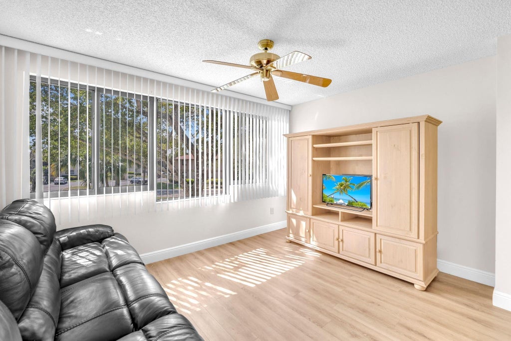 Photo of 10839 W Clairmont Circle #209, Tamarac, FL 33321 (MLS # F10492280)