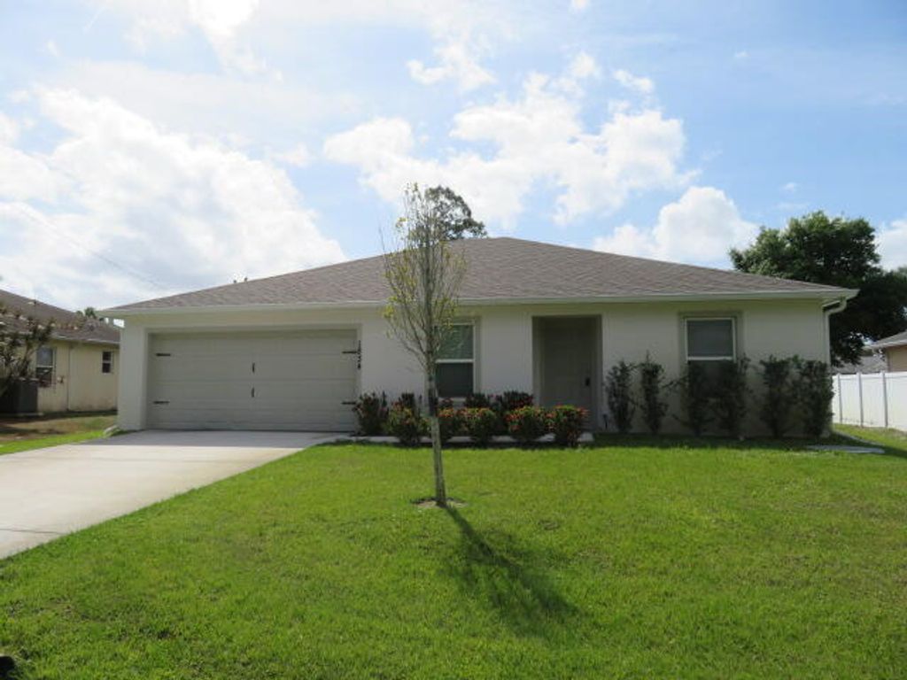 Photo of 1834 SW Lennox Street, Port Saint Lucie, FL 34953 (MLS # R10975538)