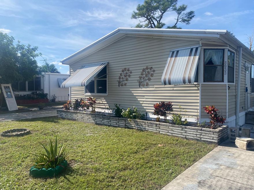 Discover this beautifully maintained and exceptionally spacious 2/2 mobile home, complete with a separate in-law suite--ideal for accommodating extended family or providing guests with added comfort and privacy. The property features 2 driveways offering ample parking, along with a generous backyard perfectly suited for entertaining or enjoying quiet outdoor moments. Water is included in the monthly rent, adding extra convenience and value.This home is ideally located close to shopping centers and just a short distance from major highways, ensuring easy access to everyday essentials and seamless commuting. Nestled within a warm and friendly 55+ community, this property offers both comfort and peace of mind.  A truly inviting home--don't miss the opportunity to make it yours!