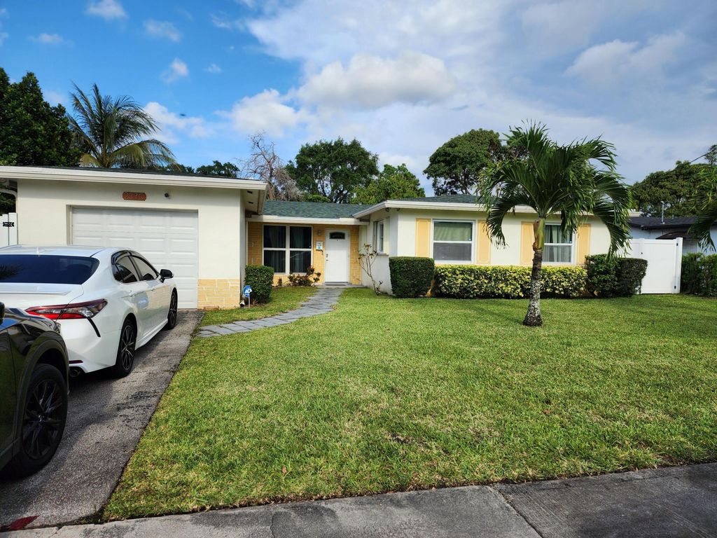 Photo of 2330 NW 47th Avenue, Lauderhill, FL 33313 (MLS # B26021047)