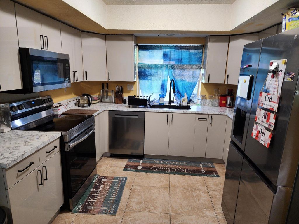 Photo of 2330 NW 47th Avenue, Lauderhill, FL 33313 (MLS # B26021047)