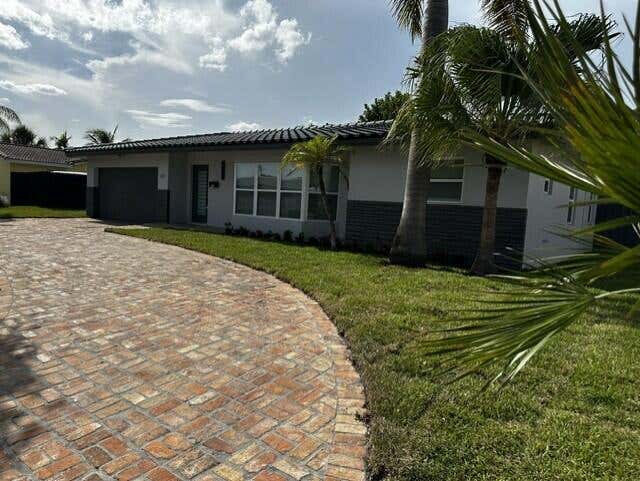 Photo of 2521 NE 45th Street, Lighthouse Point, FL 33064 (MLS # B26037657)