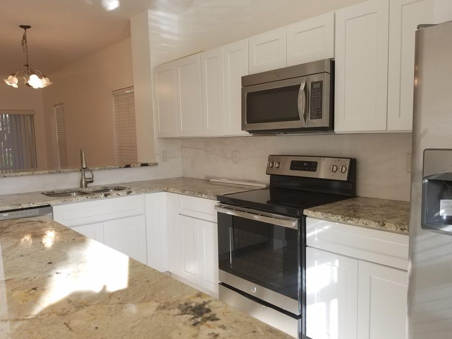 BEAUTIFUL CORNER UNIT TOWN-HOME WITH TWO (2) BEDROOMS EACH WITH OWN BATHROOM.LAMINATE FLOORS. KITCHEN WITH STAINLESS STEEL APPLIANCES, GRANITE COUNTERTOPS. SCREENED-IN PATIO HURRICANE SHUTTERS & CABLE INCLUDED. CLUB HOUSE WITH POOL, EXERCISE ROOM, BILLIARDS, COMMUNITY ROOM & RACKETBALL!!! A-RATED SCHOOLS!!!