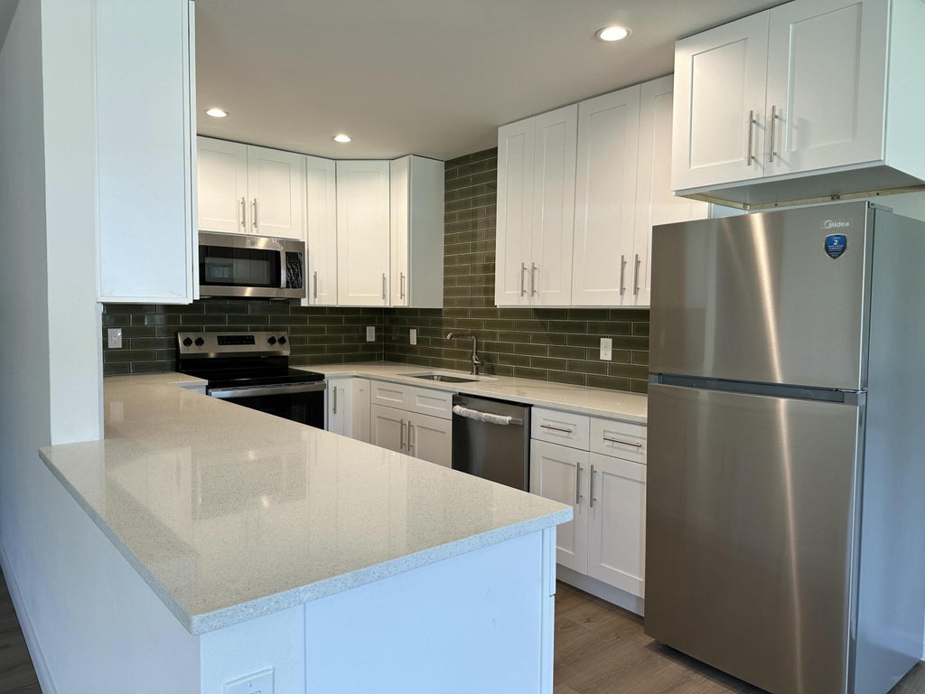 Photo of 1913 WYOMING Avenue, Fort Pierce, FL 34982 (MLS # B26067550)