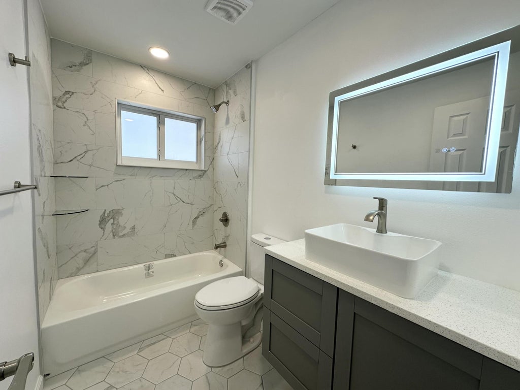 Photo of 1913 WYOMING Avenue, Fort Pierce, FL 34982 (MLS # B26067550)