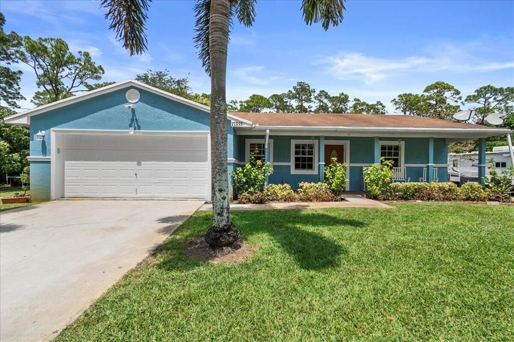 Photo of 17355 NW 92nd Lane N, The Acreage, FL 33470 (MLS # R10882037)