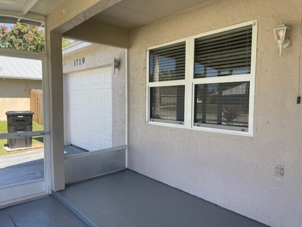 Photo of 1719 SW Import Drive, Port Saint Lucie, FL 34953 (MLS # R11075258)