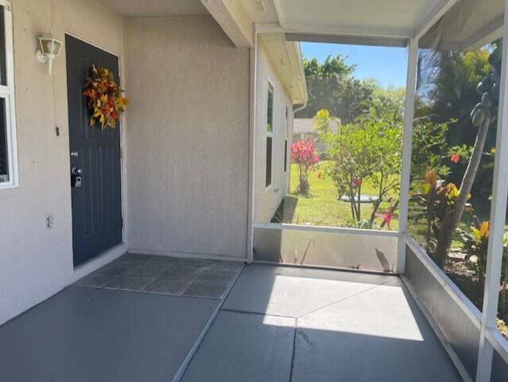 Photo of 1719 SW Import Drive, Port Saint Lucie, FL 34953 (MLS # R11075258)