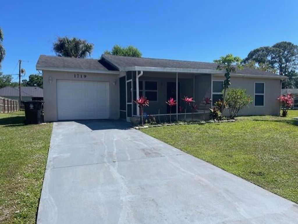 Photo of 1719 SW Import Drive, Port Saint Lucie, FL 34953 (MLS # R11075258)