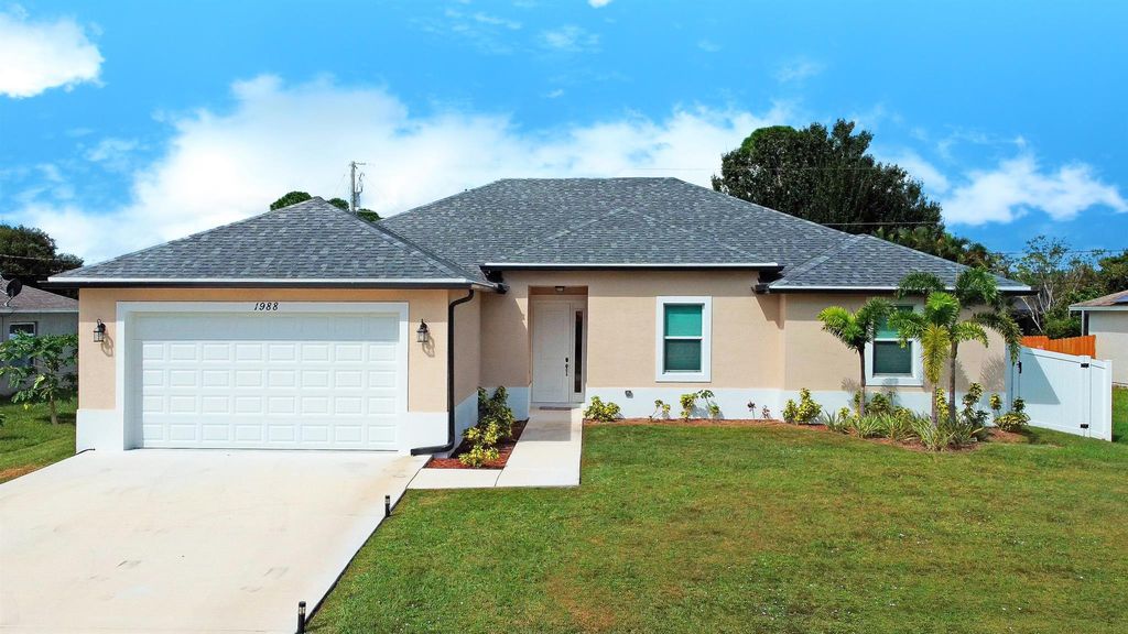 Photo of 1988 SW Hillman Street, Port St Lucie, FL 34953 (MLS # R10932474)