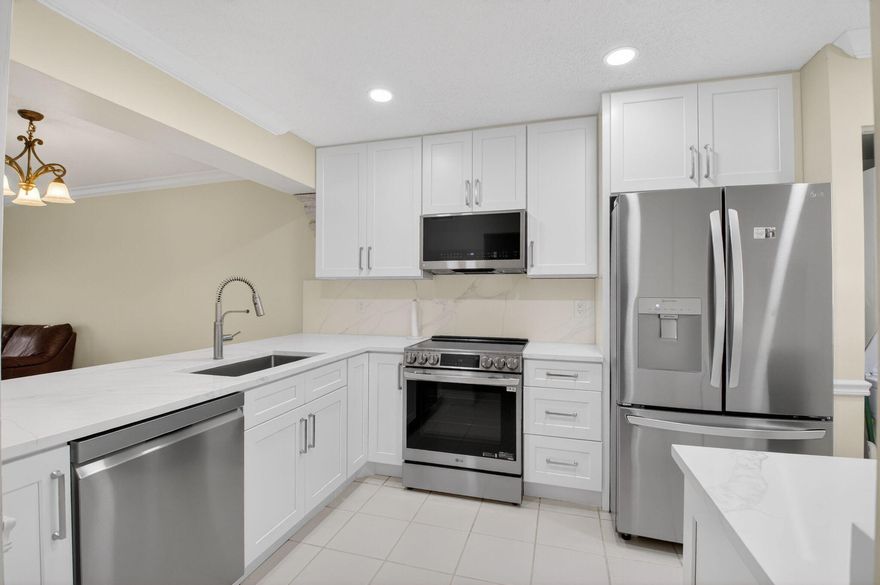 Move right into this beautifully remodeled 2-bedroom, 2-bath residence located on the ground level of a quiet, beautifully maintained community in East Boca Raton, just minutes from the ocean and vibrant Delray Beach. This move-in-ready unit features a new kitchen with quartz countertops and nicely appointed stainless steel appliances, stylishly updated bathrooms, an in-unit washer and dryer, and full impact windows throughout for added security and peace of mind. Enjoy a relaxed lifestyle with access to a community pool, tennis courts, and expansive green spaces. Pets are welcome, and this is an all-ages community. Rental flexibility allows leasing once per year with a 90-day minimum (must own for 1 yr) ; ideal for full-time living or seasonal enjoyment in a prime coastal location.