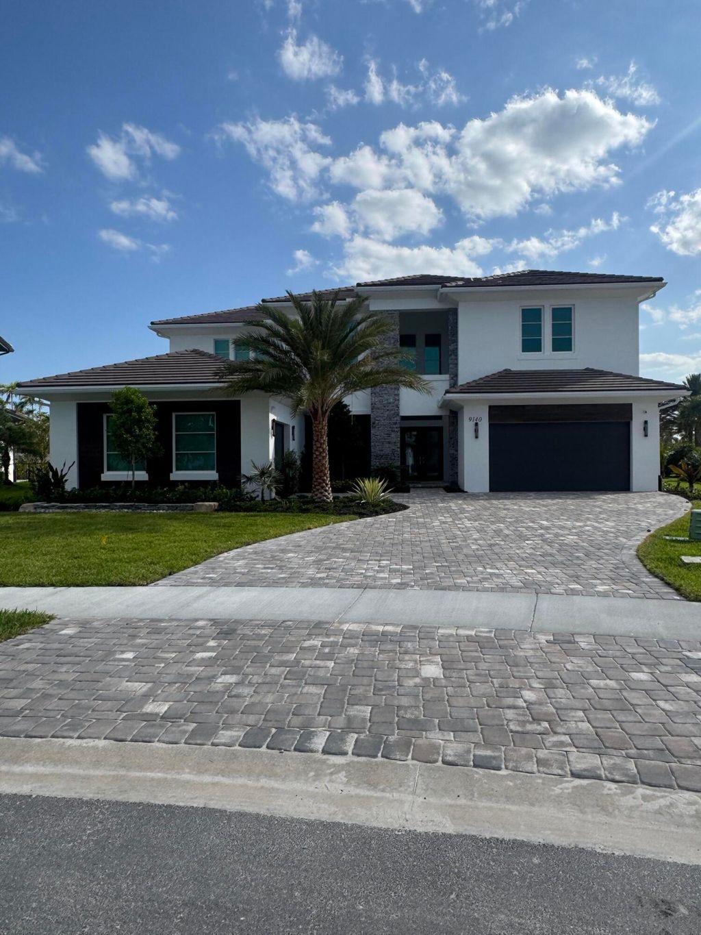 Photo of 9140 Coral Isles Circle, Palm Beach Gardens, FL 33412 (MLS # B26023877)
