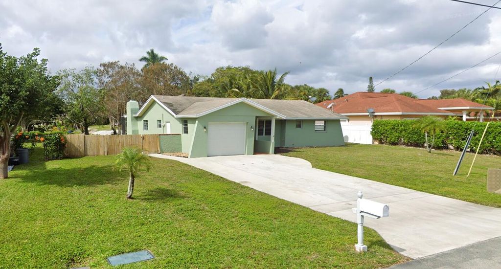 Photo of 1317 Willow Road, West Palm Beach, FL 33406 (MLS # B26036583)
