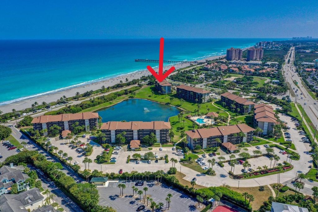 Photo of 701 S Seas Drive #104, Jupiter, FL 33477 (MLS # R11046926)